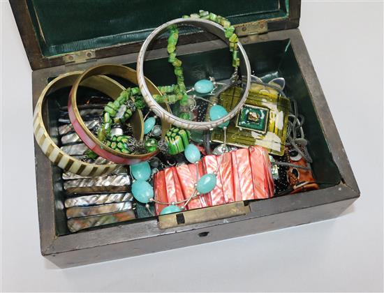 A box of mixed costume jewellery.